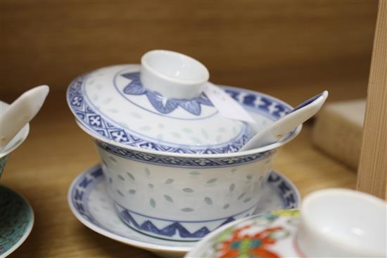 Five Chinese porcelain rice bowls, covers and stands, together with two spoons, second half 20th century, bowls 10.5cm diameter